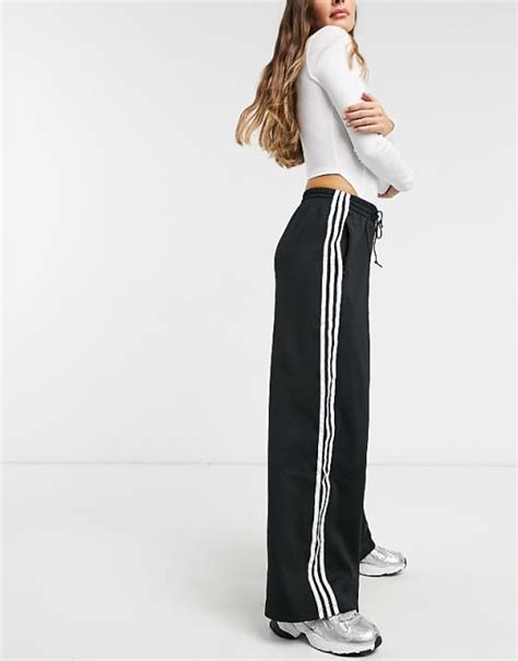 adidas broek zwart met rode strepen|Adidas broek dames.